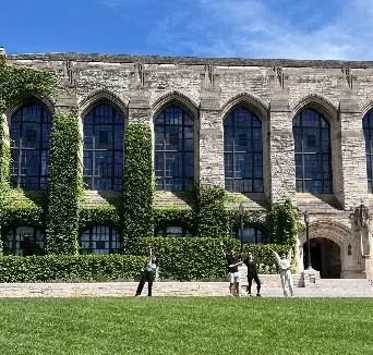 The Gothic stone facade of a campus library