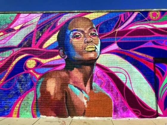 A mural stop on Northalsted's #WalkWithPride art tour in Chicago